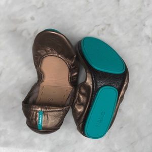 Brand new, never worn, Metallic Bronze Tieks size 6.